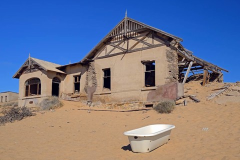 House that has been filled by desert sand