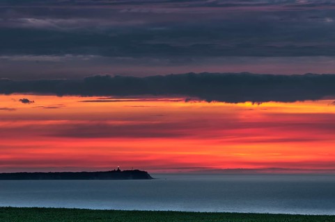 Views towards Cape Arkona with a lighthouse at sunset