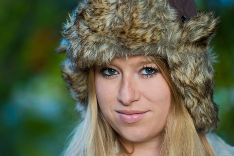 Young woman wearing a fur hat