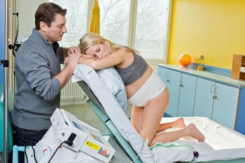 Man and woman in the delivery room during childbirth