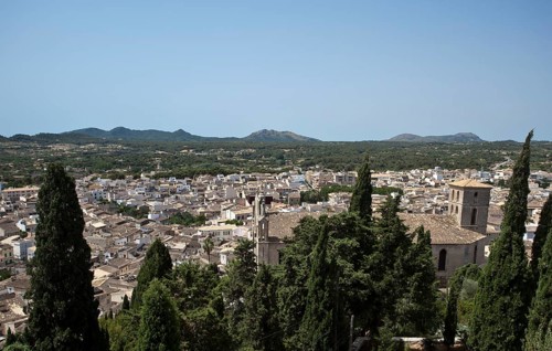 Church of Sant Salvador behind cypresses