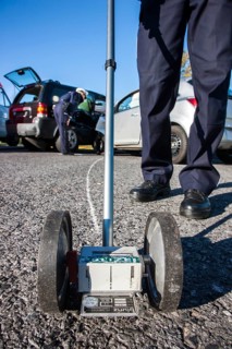 Policeman taking measures on the road after an accidence