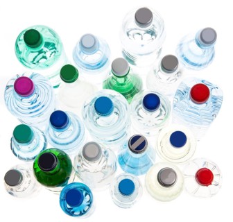Different varieties of mineral water in bottles made of glass and plastic or PET