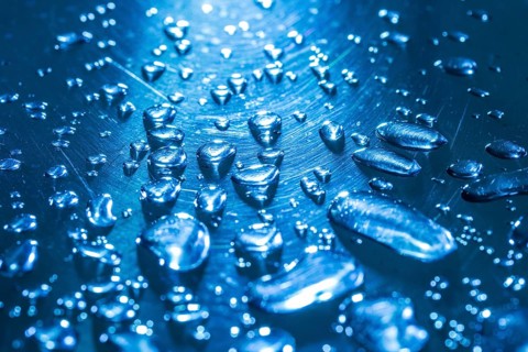 Water droplets on a metal surface