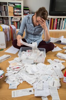 Woman sorting documents