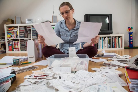 Woman sorting documents