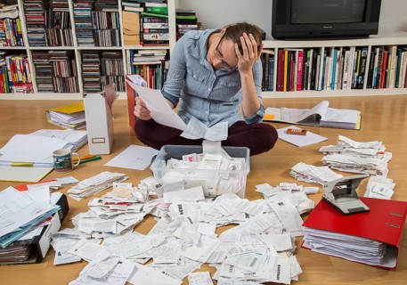 Woman sorting documents
