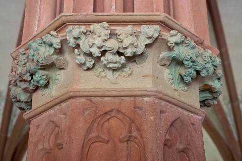 Gothic capital with floral ornaments made of sandstone