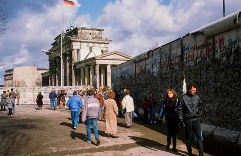 Flag of the GDR waving behind the quadriga on Brandenburg Gate
