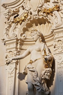 Female figure with a theatre mask