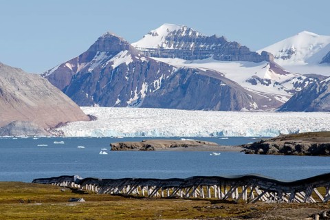Old water pipeline built above ground on stilts because of the permafrost