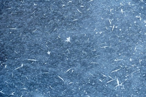Frost crystals on a patch of ice