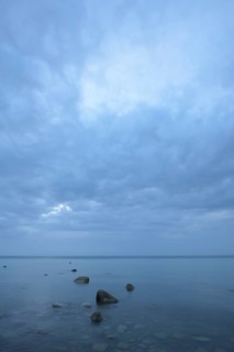 Stones at a Baltic Sea beach at the blue hour