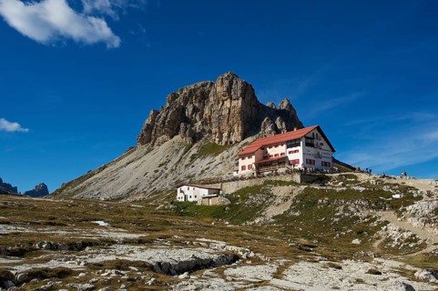 Dreizinnenhuette or Three Peaks Alpine hut with Toblinger Knoten Mountain
