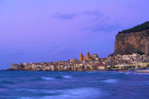 Historic town centre with the Cathedral of San Salvatore and Rocca di Cefalu at dusk