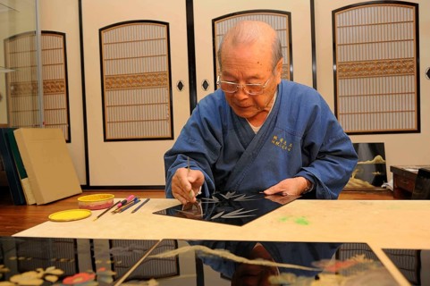 Japanese artisan in his workshop