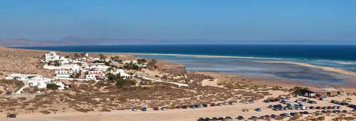 Dune landscape near Los Gorriones and the lagoon at back