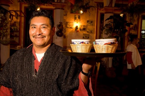 Operation in traditional costume at the restaurant 'El fogon de Jovel'