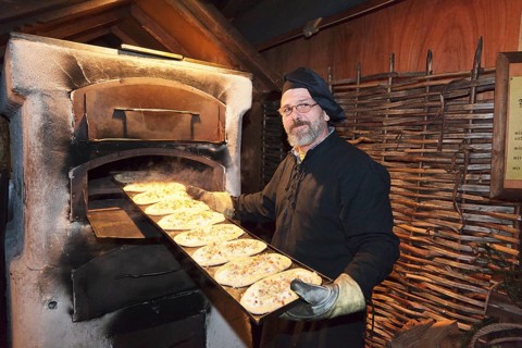 Tarte flambee baker at the Medieval Market