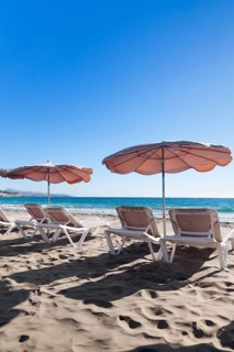 Sun beds and sunshades on the beach