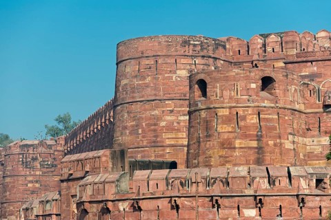 Fortified outer walls with battlements and loopholes