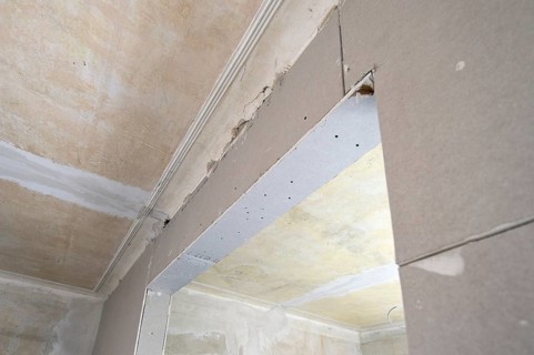 Half-timbered walls coated with plasterboards