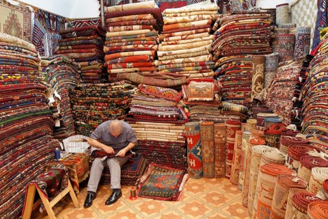 Man in a carpet dealer's store