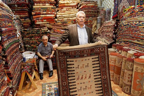 Men in a carpet dealer's store
