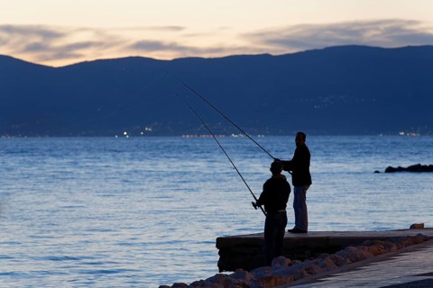 Anglers at dusk