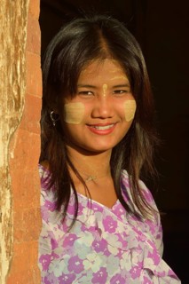 Girl with thanaka paste on her face