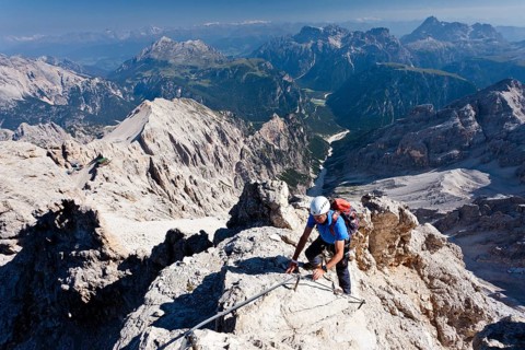 Mountain climbers decending along the Via Ferrata Marino Bianchi climbing route on Mount Cristallo