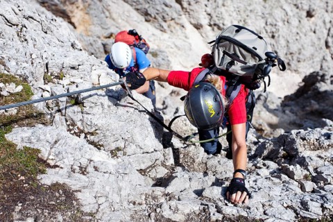 Mountain climbers during the ascent to the summit of Plattkofel Mountain via the Oskar Schuster Via Ferrata climbing route