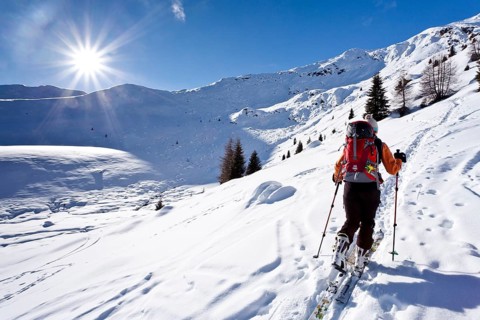 Cross-country skier ascending Wurzer Alpenspitz Mountain in the Ridnauntal Valley