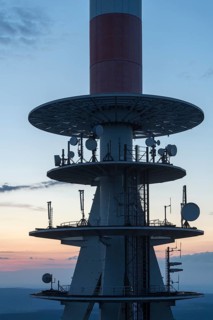 Transmission tower on the summit plateau of Mt Brocken at dusk