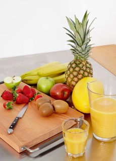 Various types of fruit on a cutting board