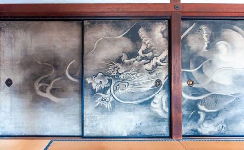 Dragon on a paper wall