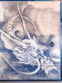 Dragon on a paper wall
