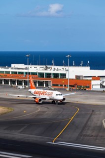 Airbus from easyjet.com in front of the terminal of Madeira Airport