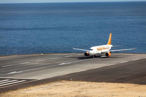 Airbus from easyjet.com preparing for takeoff at Madeira Airport