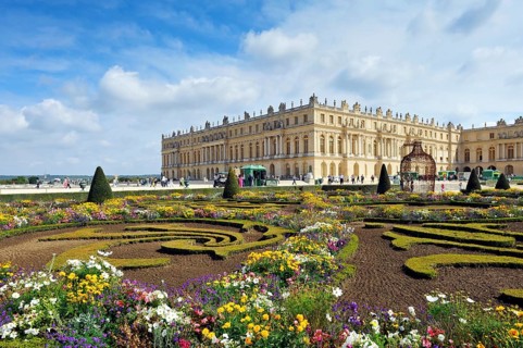 Palace of Versailles with the gardens Parterre du Midi
