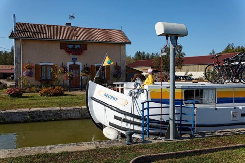 Boat in the lock chamber waiting locking to go downstream