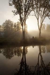 Cyclist on the towpath along the Canal des Vosges