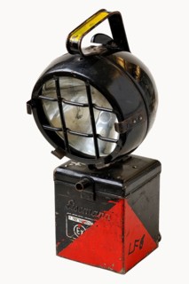 Flashlight with a battery compartment from the fire department