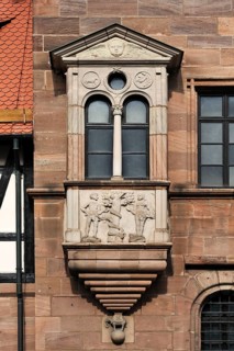 Bay window with a relief of the Fall of Man