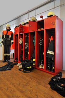 Opened firefighter's lockers during a fire alarm