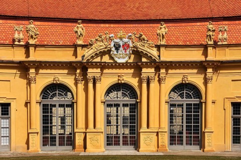 Entrance portal with the coat of arms of the alliance of the margravial constructors at the Orangery in the Castle Garden