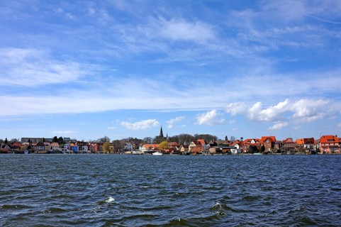 Townscape of the island town of Malchow and Malchow Lake