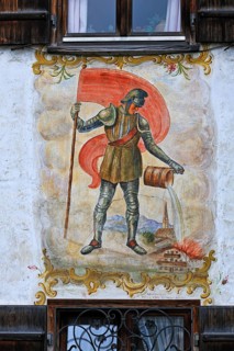 Lueftlmalerei mural of St. Florian from 1936 on the facade of a farmhouse