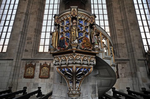 Ornate sandstone pulpit with tracery