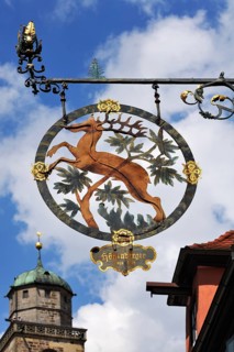 Hanging sign of the guesthouse and former Brauner Hirsch brewery